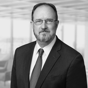 Kevin Wolf (Partner at Akin Gump)